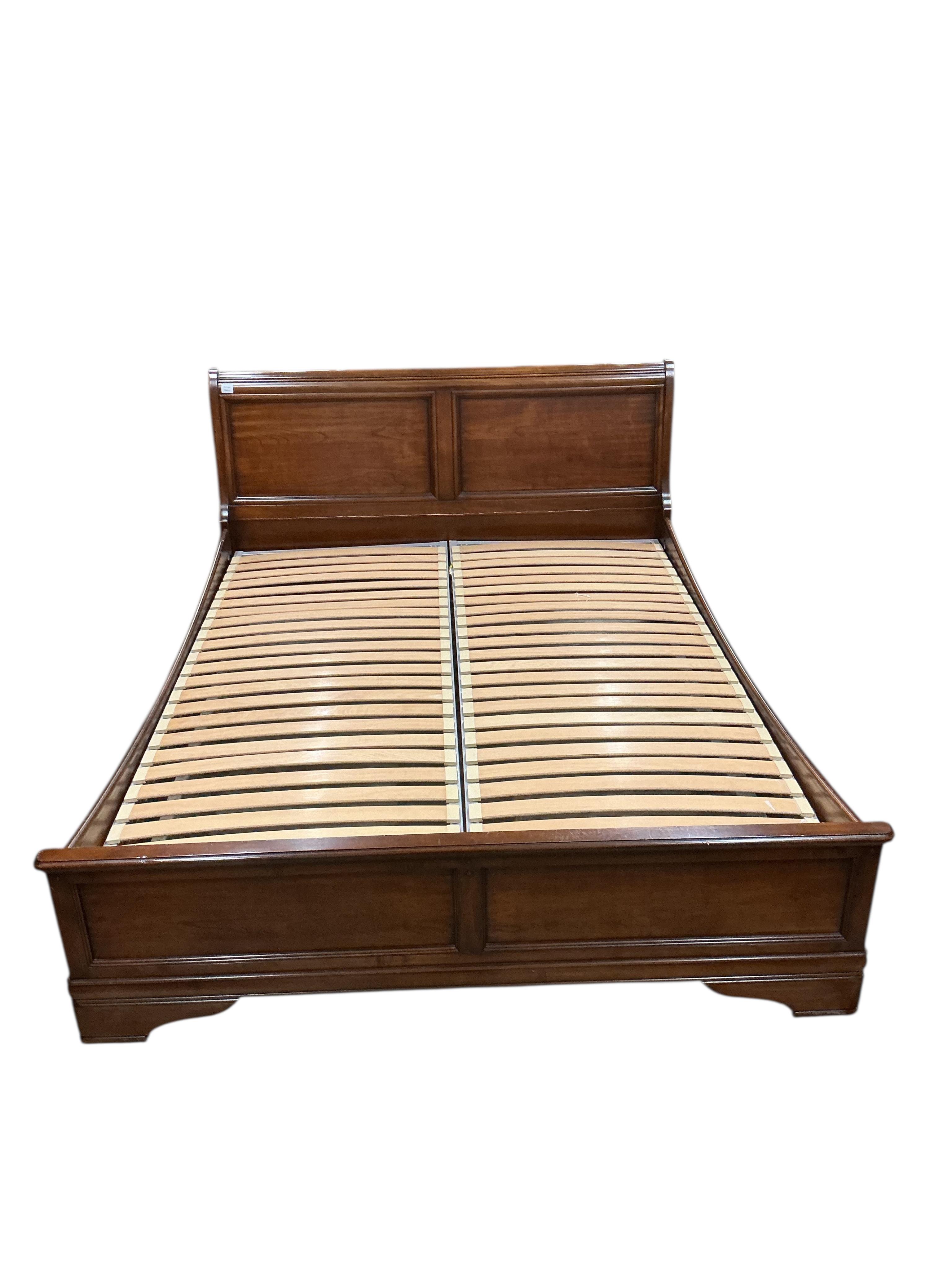 A reproduction mahogany sleigh bed, width 168cm, length 210cm, height 100cm